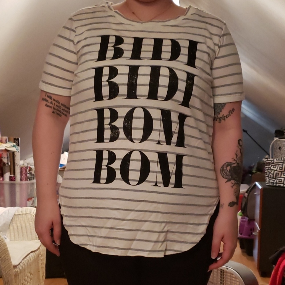 Gray and white striped t-shirt with Selena lyrics